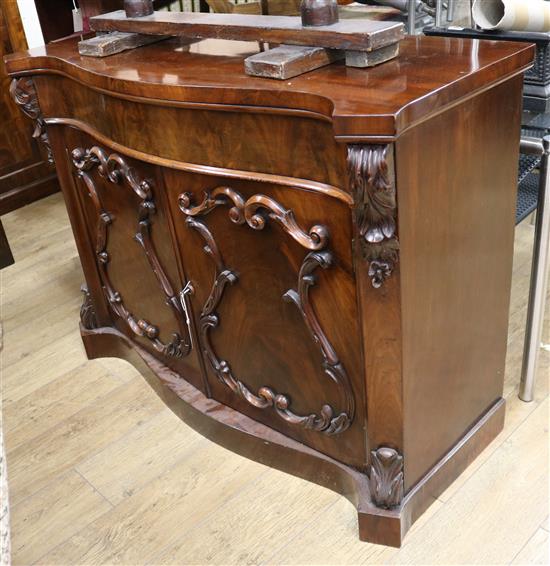 A Victorian mahogany serpentine fronted sideboard W.126cm